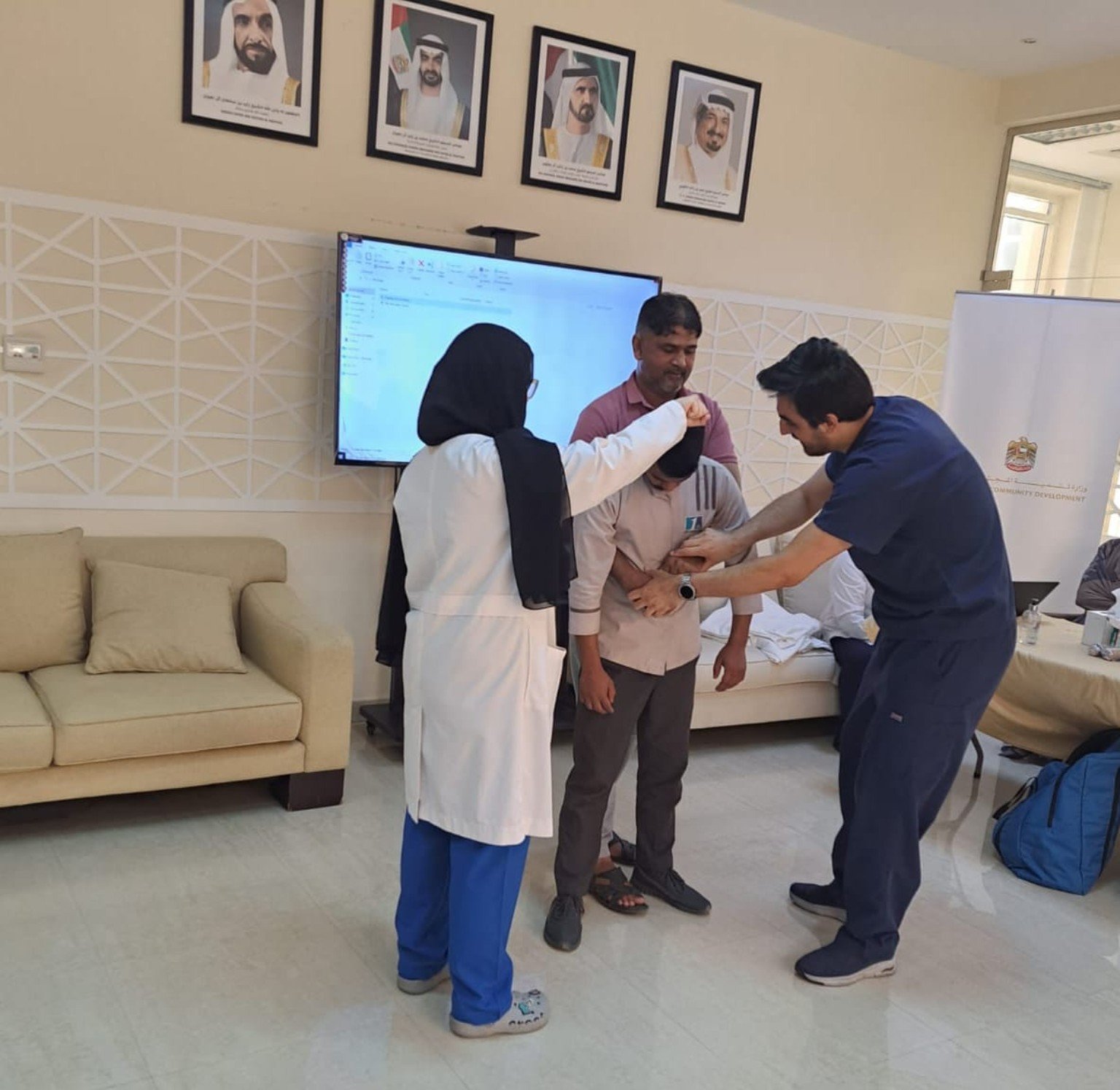Dr. Alireza Amin guiding participants through a simulated choking-response exercise