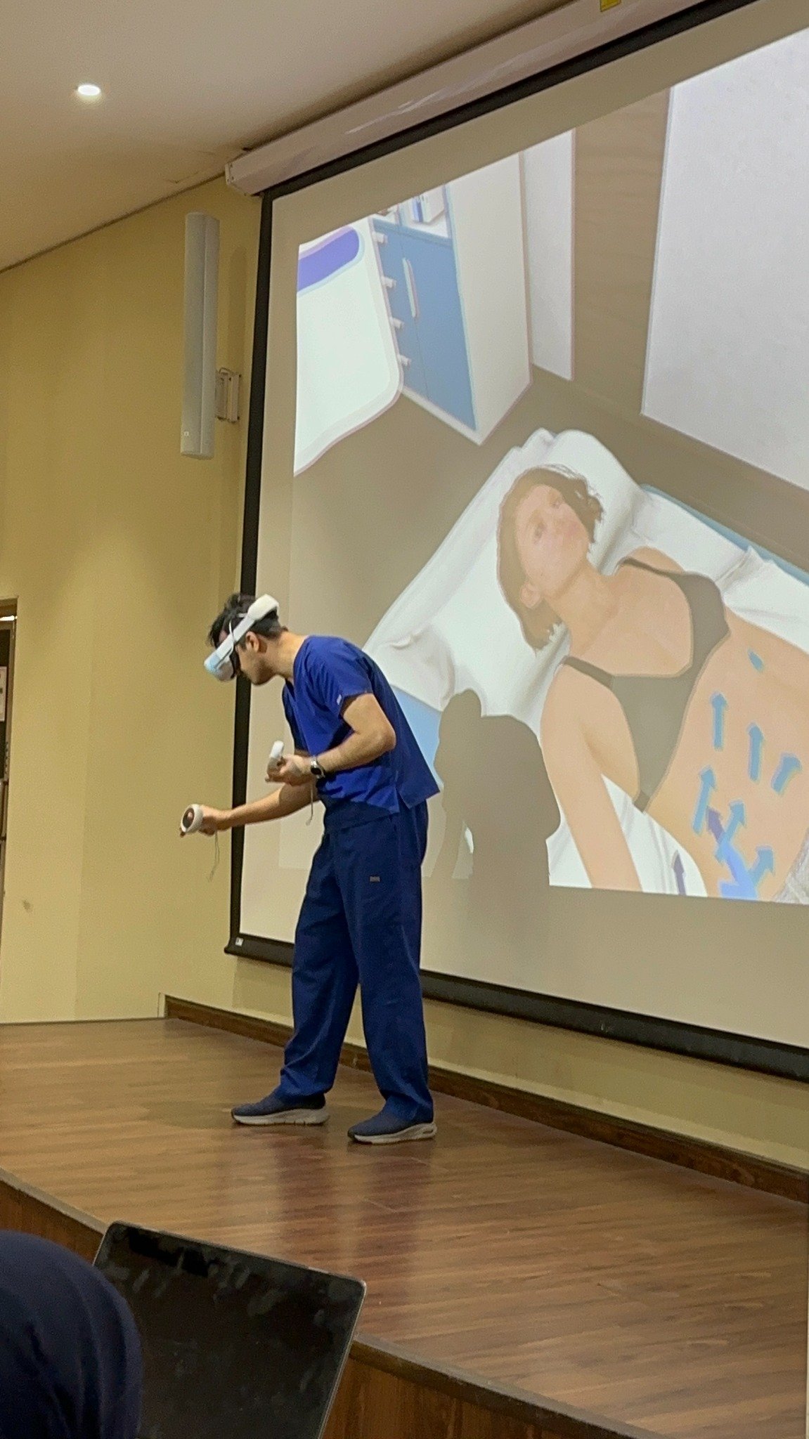 Virtual abdominal-examination demonstration with a projected view